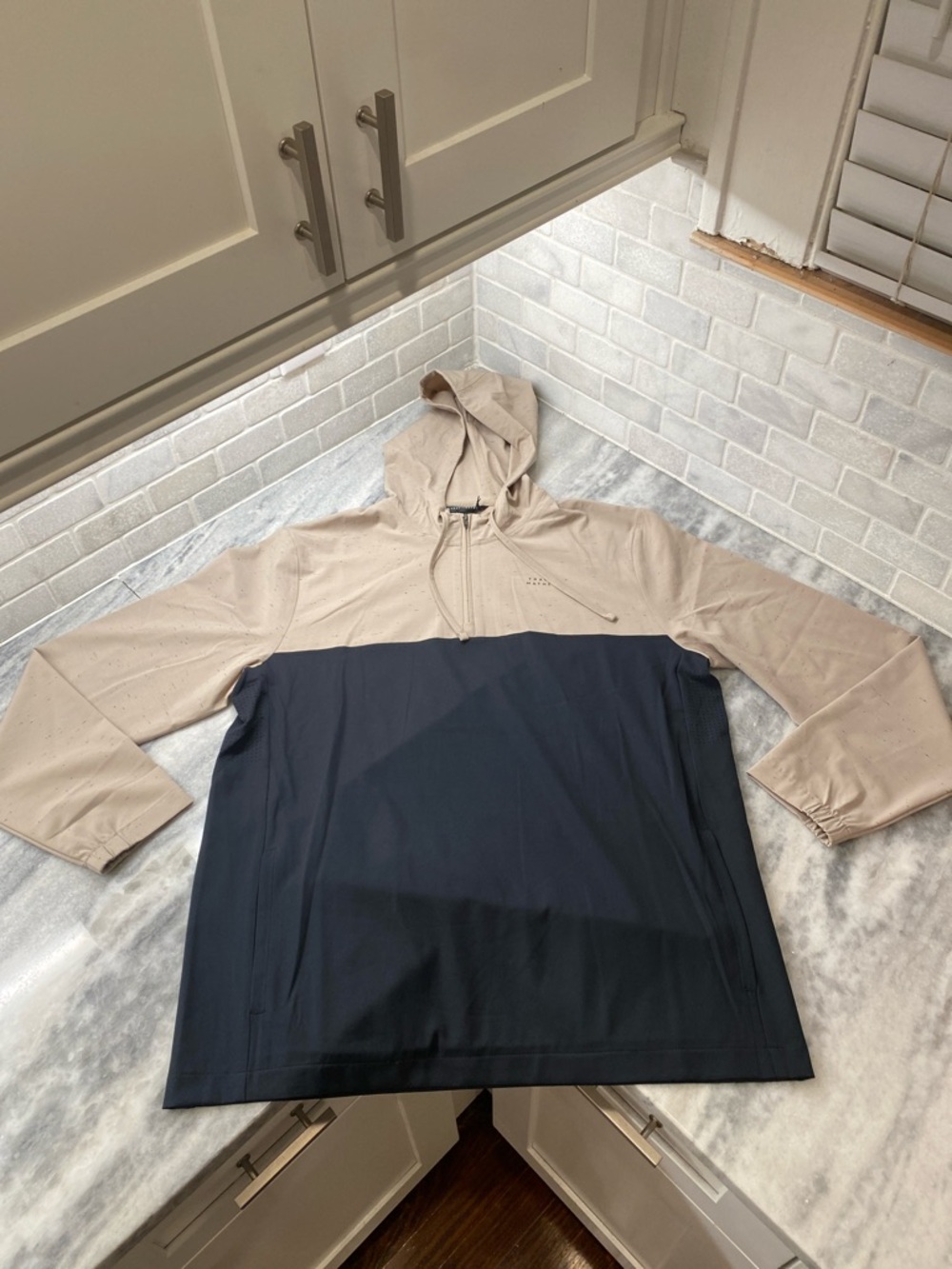 Travis Mathew Two-Tone Hooded Pullover - Beige & Navy